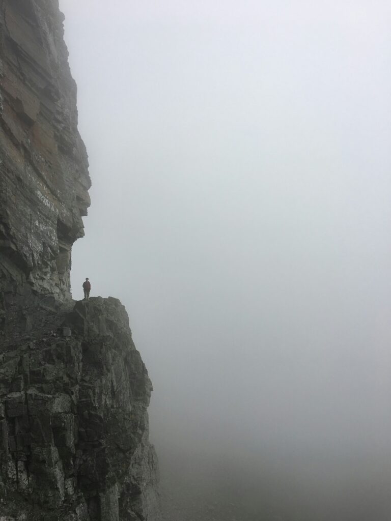 Standing close to danger.